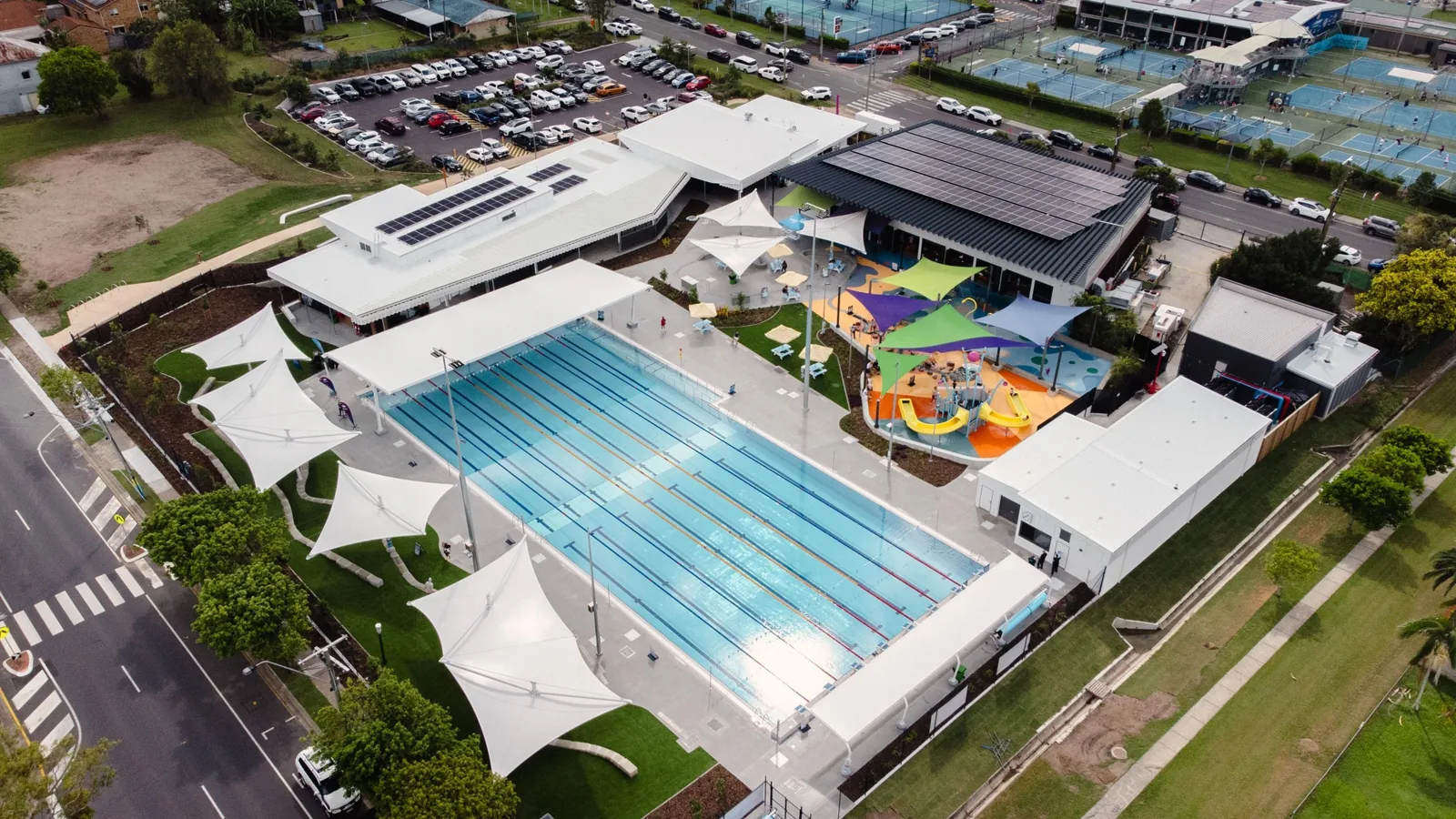 Aerial view of the 50m pool and splash park at Beenleigh Aquatic Centre