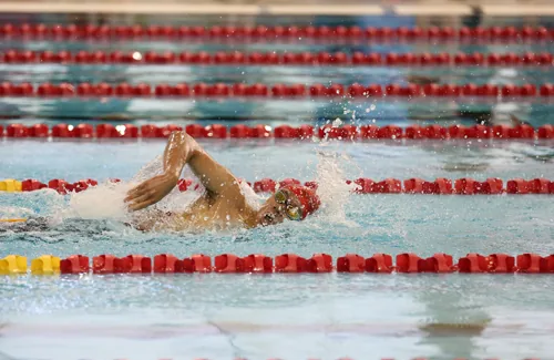 Swimmer in the lanes of the 50m pool at Markham Pan Am Centre